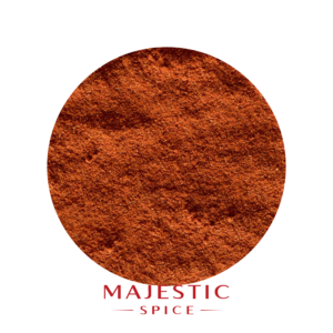 Circular mound of finely ground reddish-brown California chili powder with a smooth texture, with the red Majestic Spice logo below.