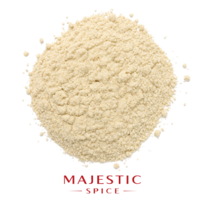 Mound of finely ground garlic Parmesan seasoning with a pale cream color, fine granules, and small clumps, with the red Majestic Spice logo below.