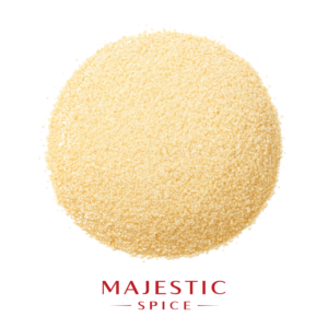 Mound of pale golden granulated onion with a coarse, uniform texture and scattered granules, with the red Majestic Spice logo below.