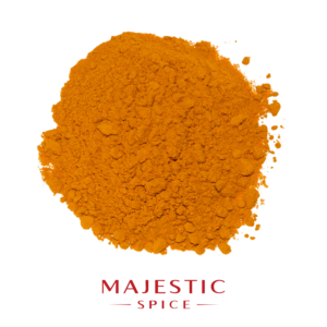Mound of finely ground golden-orange turmeric powder with a smooth texture and scattered particles, with the red Majestic Spice logo below.